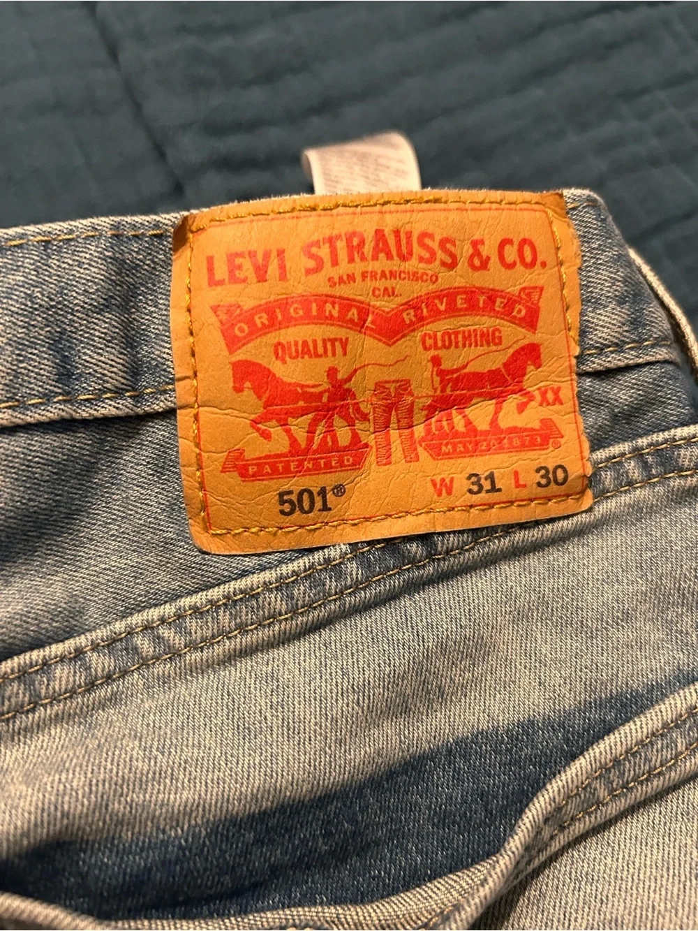 Levi's 501 Slim Straight Jeans in Light Denim Wash. Size 31/30 w/ slight stretch